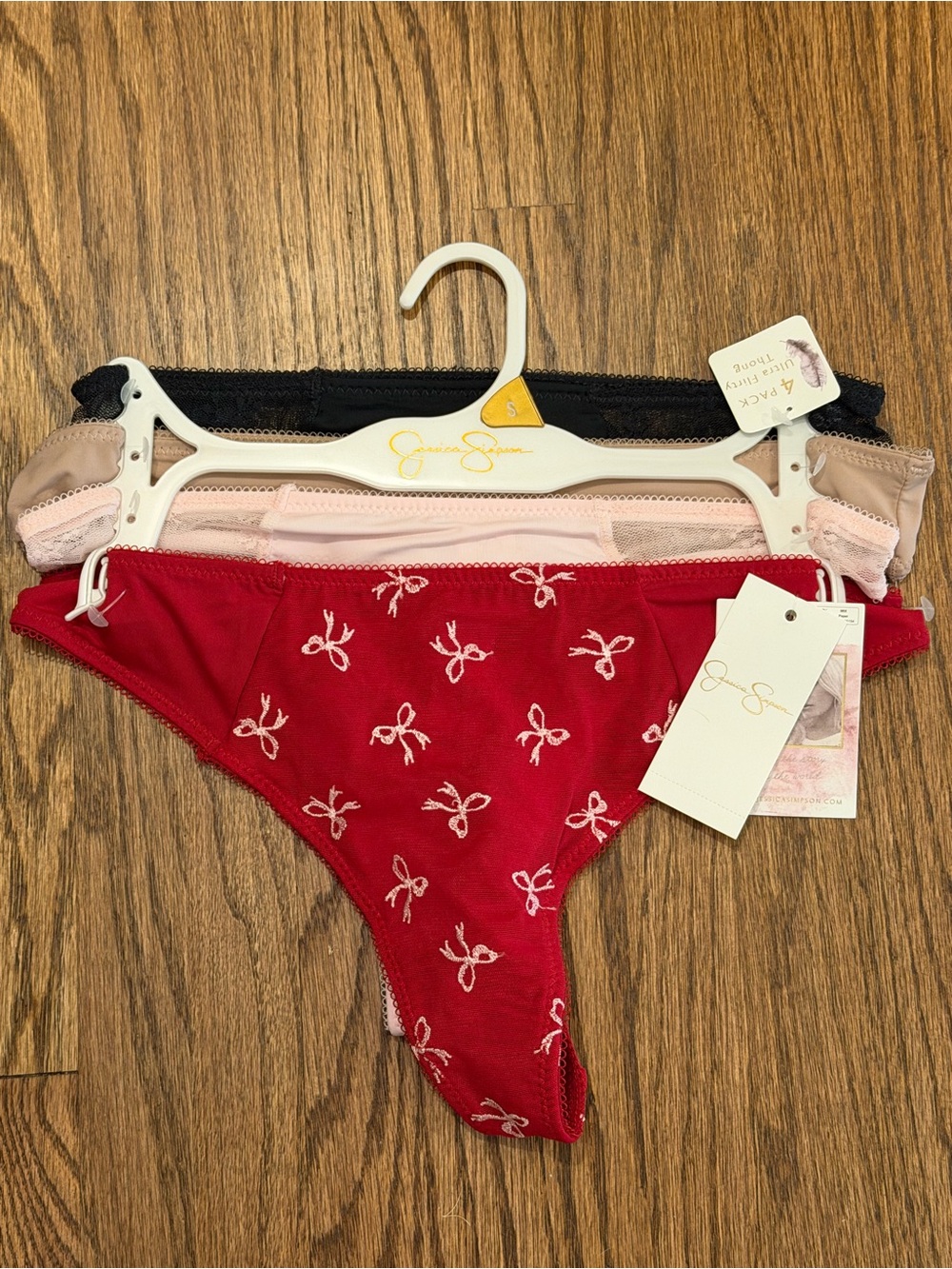 4 pack women’s thongs- Red, Pink, Black, Nude- Jessica Simpson- Small